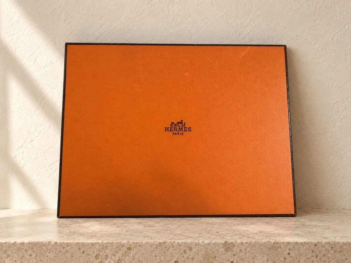 Hermès gold with gold hardware Constance slim wallet