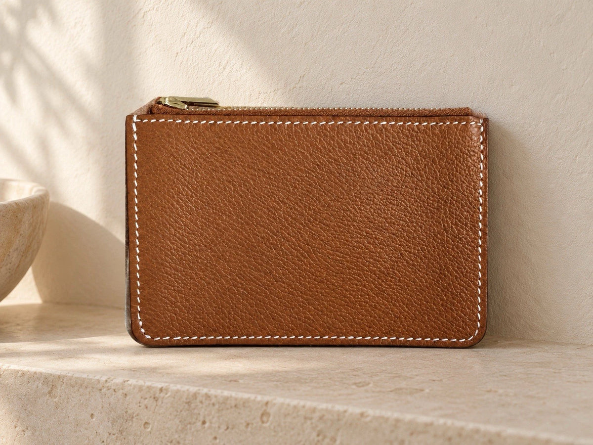 Hermès gold with gold hardware Constance slim wallet