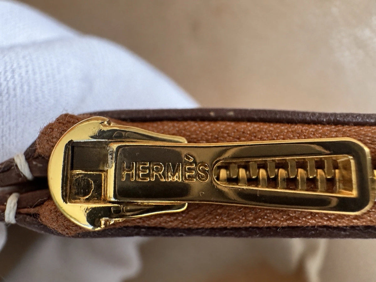Hermès gold with gold hardware Constance slim wallet