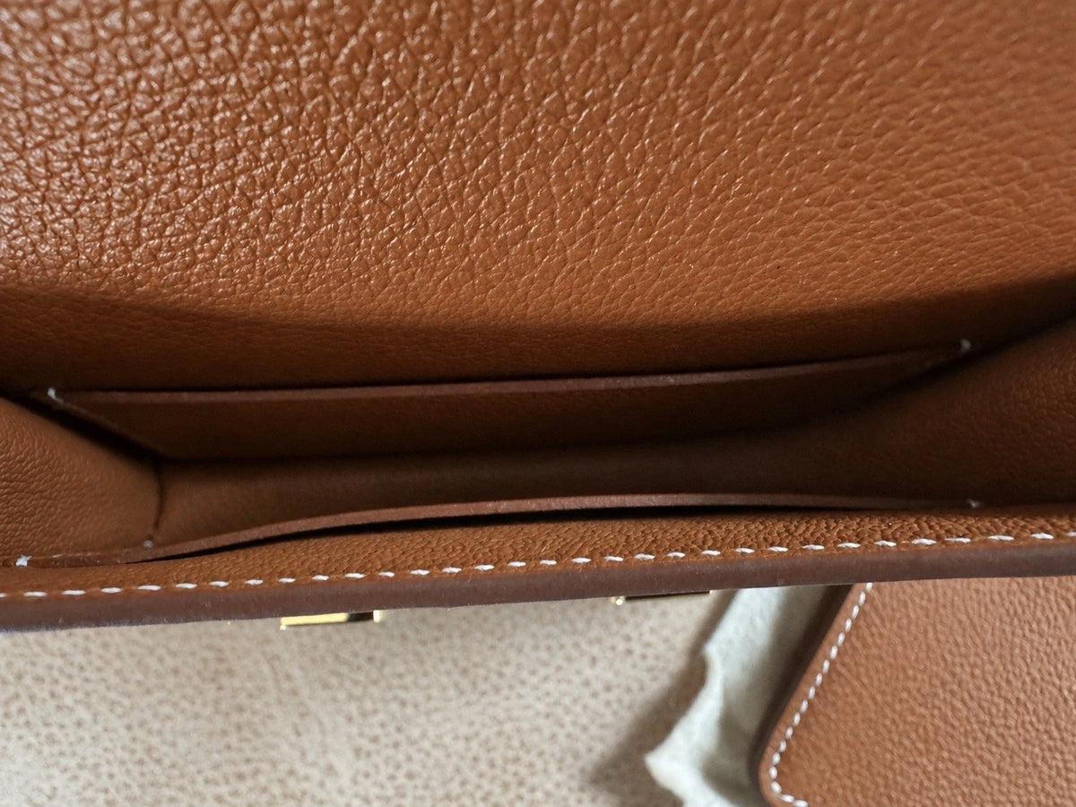 Hermès gold with gold hardware Constance slim wallet