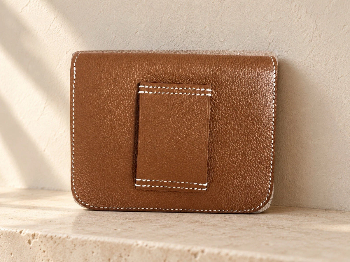 Hermès gold with gold hardware Constance slim wallet